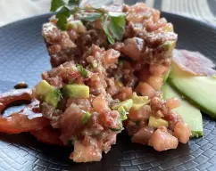 Step <p>Aliñar al gusto con el aceite, sal, mostaza y Tabasco.</p><p>Lo mejor es aliñar poco y rectificar al gusto.</p><p>Añadir un poco del perejil y el resto para decorar.</p> illustration